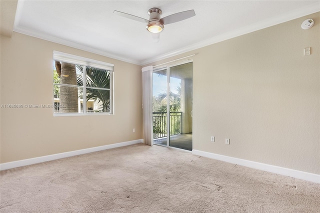4 Renaissance Way Unit 303, Boynton Beach, FL 33426 - spare room featuring ornamental molding, a ceiling fan, carpet floors, baseboards, and a smoke detector