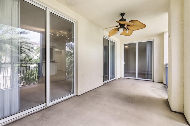 exterior space featuring ceiling fan