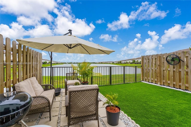 view of patio / terrace featuring a water view