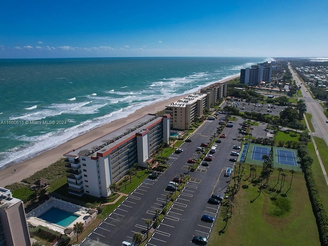 bird's eye view with a view of the beach and a water view