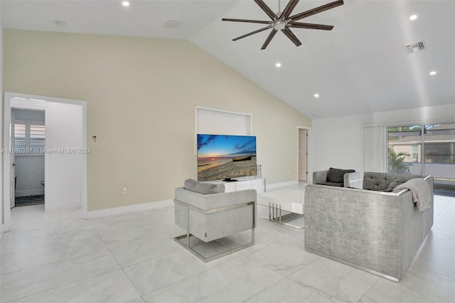 living room with ceiling fan and high vaulted ceiling