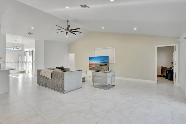 living room featuring ceiling fan and vaulted ceiling