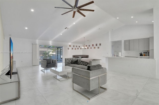 living room featuring sink, high vaulted ceiling, and ceiling fan