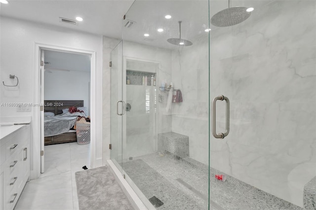 bathroom with vanity and an enclosed shower