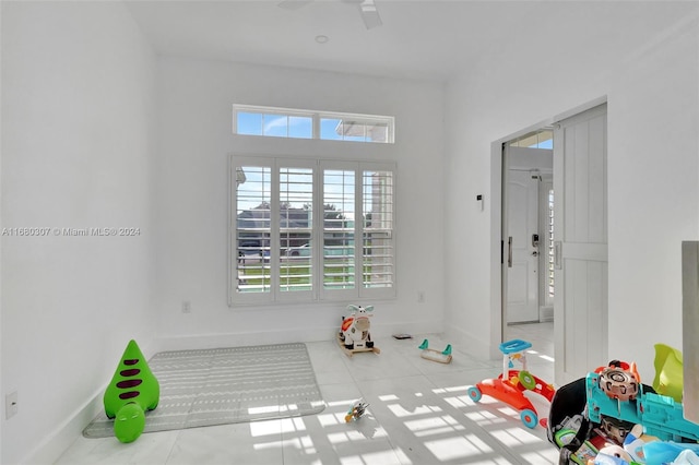 playroom featuring light tile patterned floors