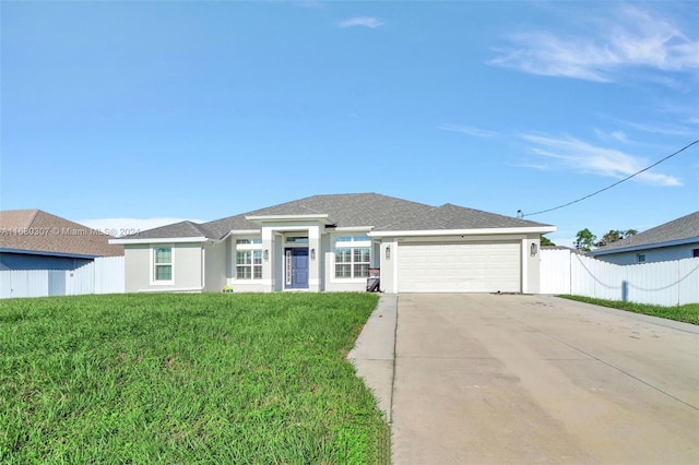 view of front facade with a front lawn and a garage