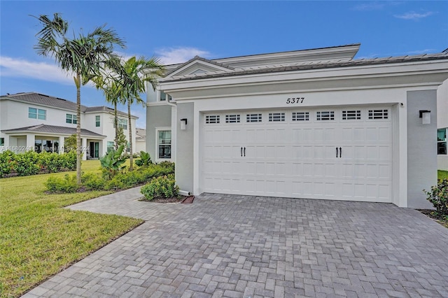 garage with a yard