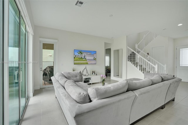 living room featuring light tile patterned floors