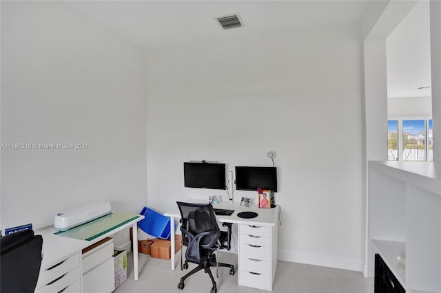 office space featuring light tile patterned flooring