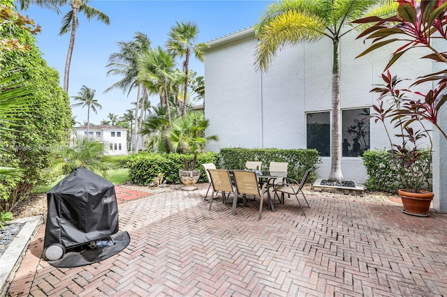 view of patio featuring a grill