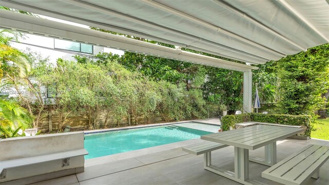 view of pool with a patio