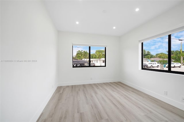 unfurnished room featuring light hardwood / wood-style flooring