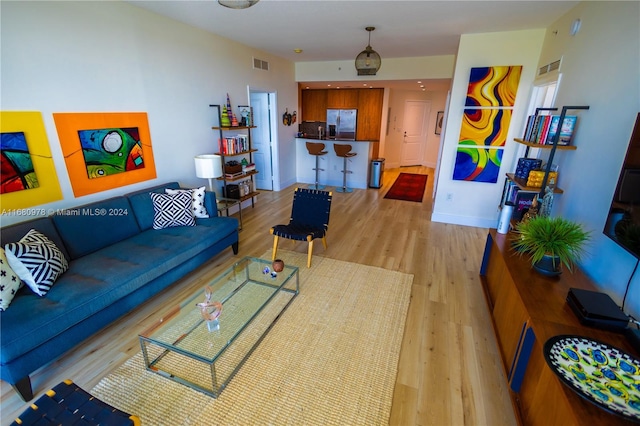 living room featuring light wood-type flooring