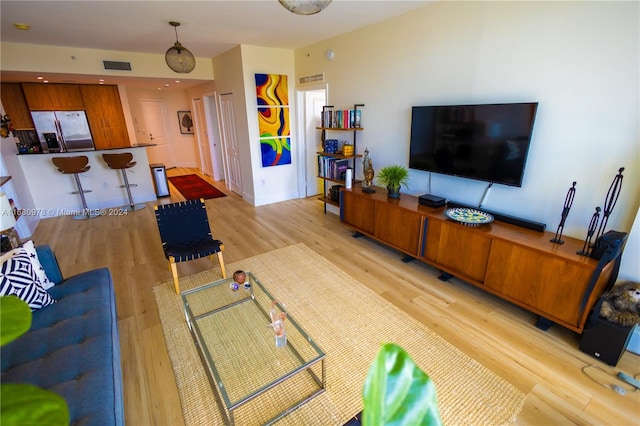 living room featuring light hardwood / wood-style floors