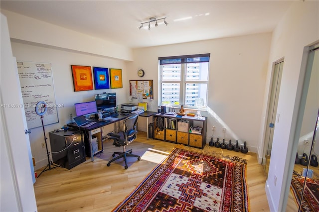 office area featuring hardwood / wood-style floors