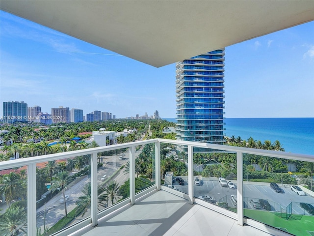 balcony featuring a water view