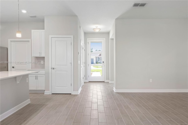 foyer entrance featuring light hardwood / wood-style flooring