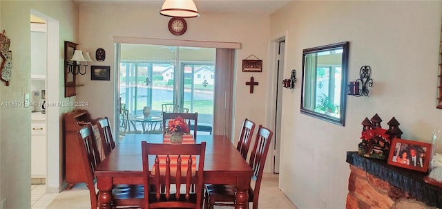 dining room featuring light tile patterned floors