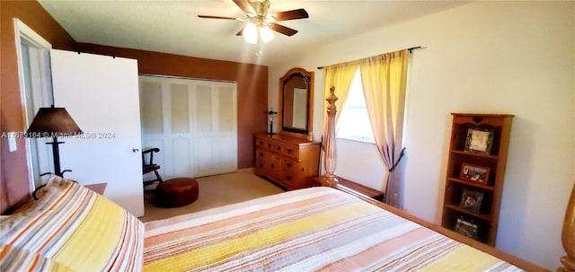 bedroom featuring ceiling fan and a closet