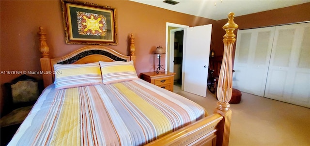 carpeted bedroom featuring a closet