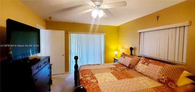 carpeted bedroom with ceiling fan and lofted ceiling