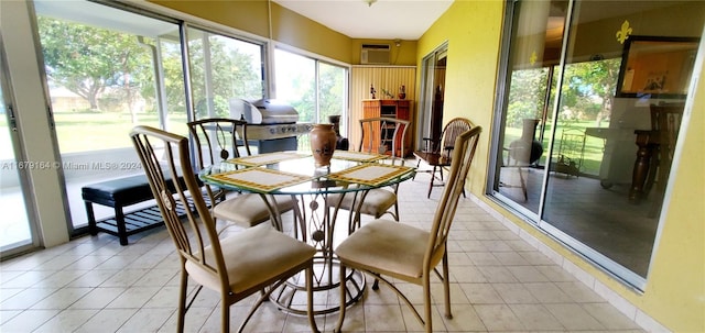 sunroom / solarium with a wall mounted air conditioner