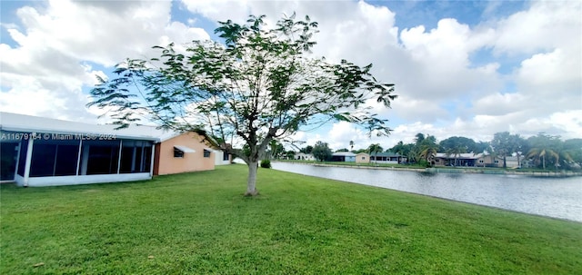 view of yard with a water view