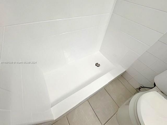 bathroom featuring toilet