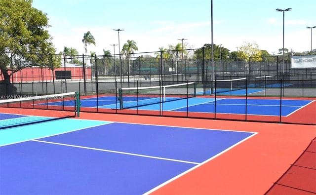 view of sport court featuring basketball hoop