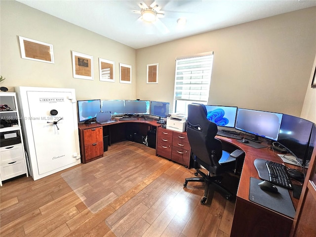 office space with light hardwood / wood-style flooring and ceiling fan