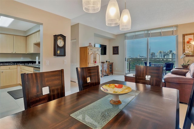 dining space with a chandelier