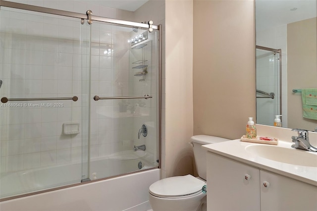 full bathroom featuring vanity, toilet, and combined bath / shower with glass door