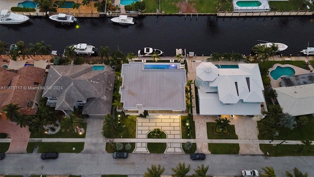 bird's eye view with a water view