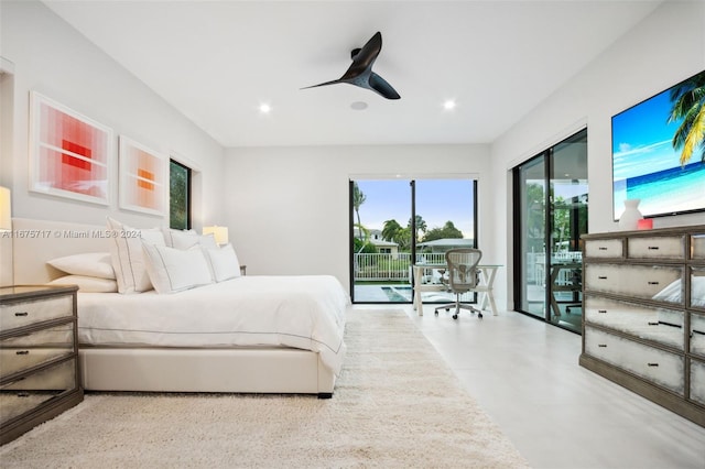 bedroom featuring ceiling fan and access to exterior