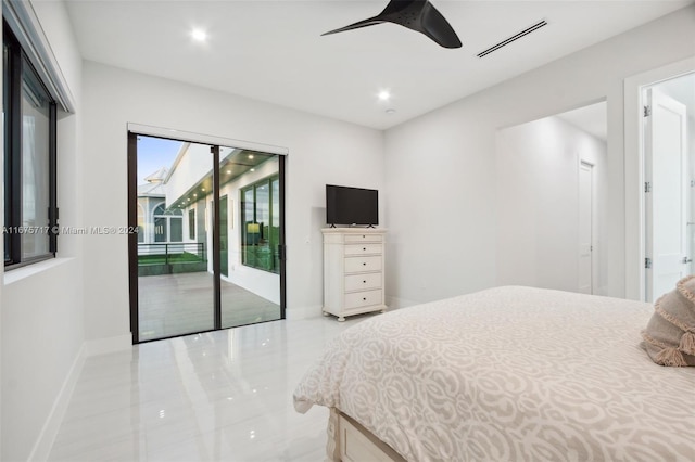 bedroom with ceiling fan, light tile patterned floors, and access to exterior