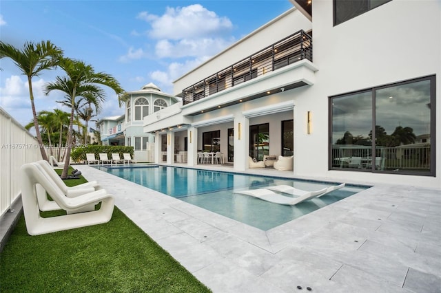 view of swimming pool featuring a patio