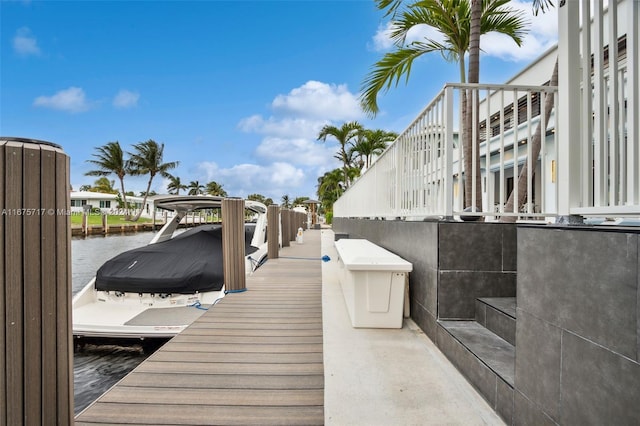 dock area featuring a water view