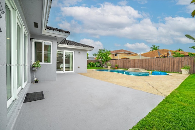 view of pool featuring a patio area