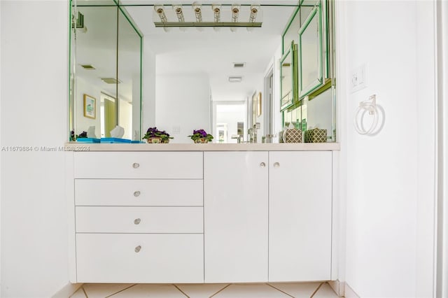 bathroom featuring vanity and tile patterned flooring