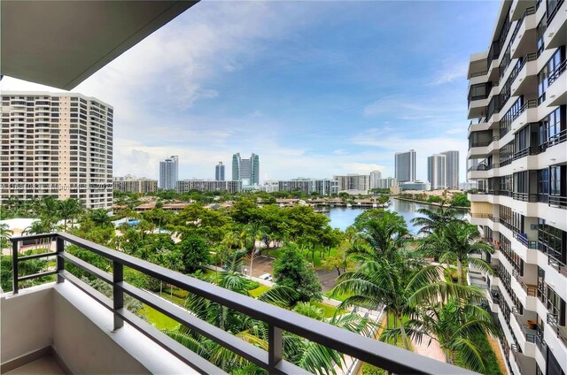 balcony featuring a water view