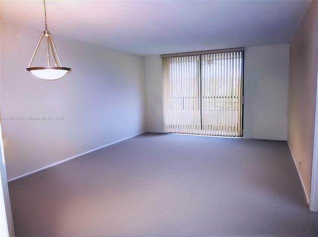 500 Three Islands Blvd Unit 116, Hallandale Beach, FL 33009 - unfurnished room with baseboards and carpet
