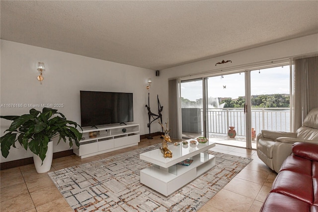 tiled living room with a textured ceiling