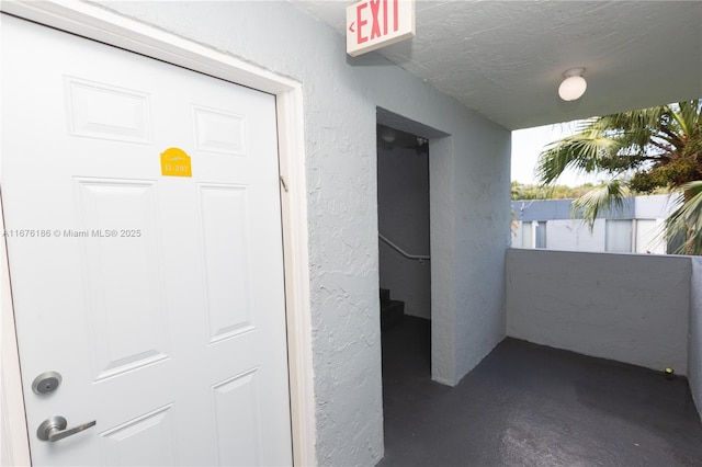 interior space with a textured ceiling