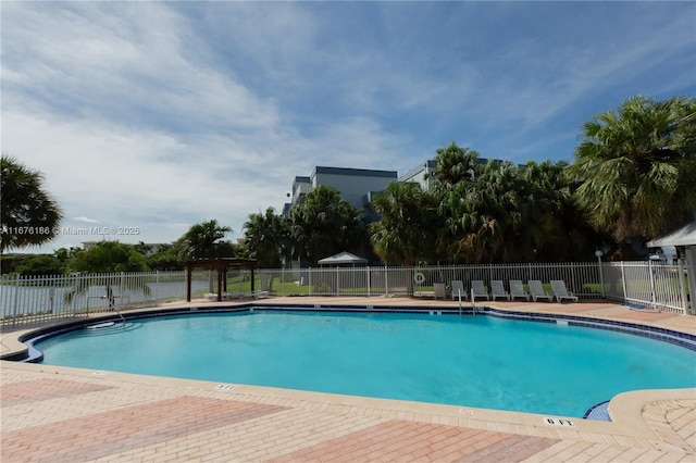 view of swimming pool with a patio