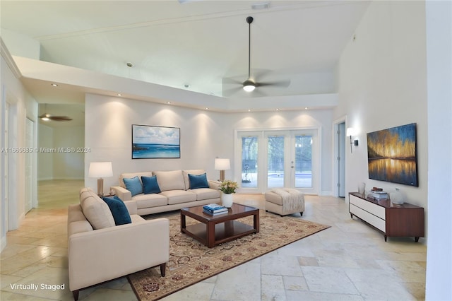 living room featuring high vaulted ceiling and ceiling fan