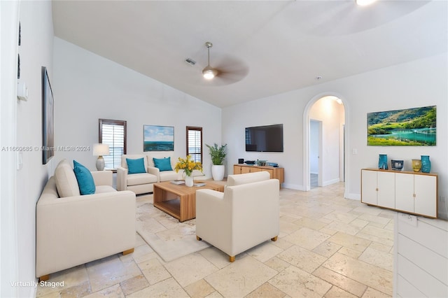 living room featuring lofted ceiling and ceiling fan