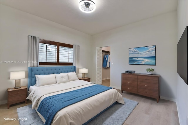 bedroom with a closet and a spacious closet