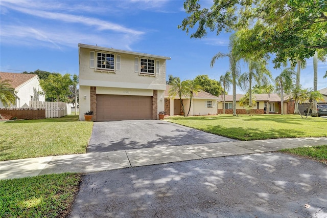 view of front of home with a front lawn and a garage