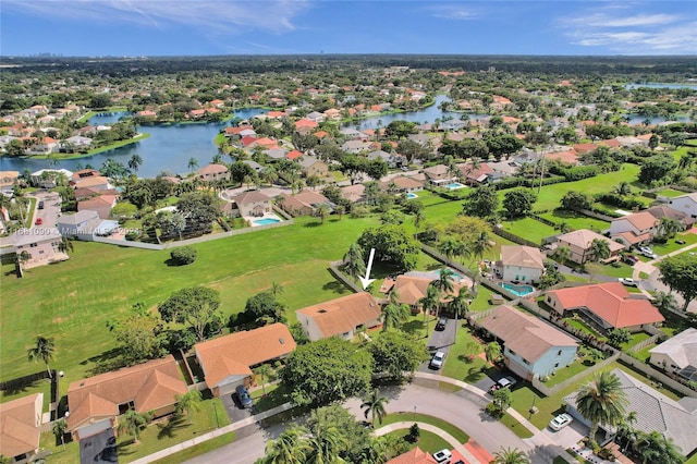 drone / aerial view with a water view