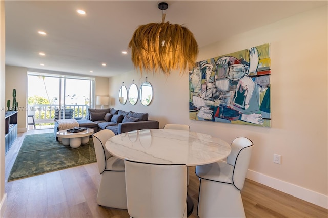 dining room featuring light hardwood / wood-style flooring